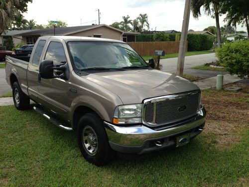 2003 ford f250 super duty 4 door extended cab xlt auto  only 61k miles! 1 owner!