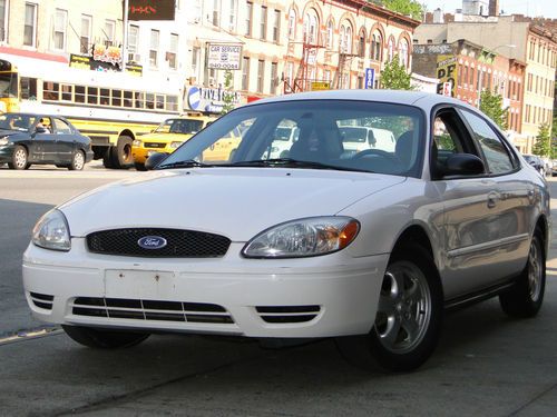 2005 ford taurus se white low miles only 84.392 must sell call 718-462-6300 sam