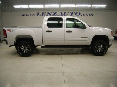 Crew short sle1 new lift new tires and rims z71 4wd we take trade and we finance
