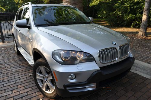 2007 bmw x5 4.8.4x4/awd.leather/panoroof/heated/18's/xenon/media/rebuilt