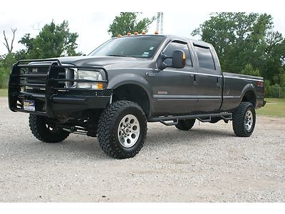 Super duty diesel 4x4 lwb lariat 6 inch lift leather ranch hand bumpers clean