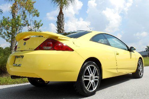 Bright zinc yellow/black leather~sunroof~cd~spoiler~florida 1 owner~certified