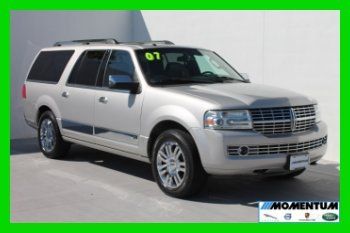 2007 linclon navigator 4x2 with nav/roof/3rd row/rear ent/very clean we finance!