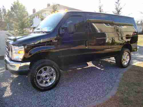 Sell used 2012 ford e-150 xlt premium 4x4 quigley van like ...