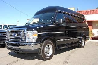 Very nice,2011 model, raised roof, ford 9 pass. conversion van!....unit# 9-1409t