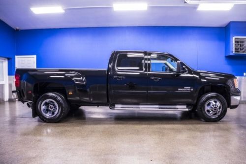 Low miles lifted crew cab 6.6l duramax diesel bed liner nerf bars leather sunroo