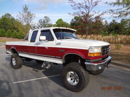 Lifted ford f-250, rebuilt engine, roll bar, 4x4, 12 inch lift! no rust!!!!