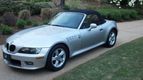 Silver on black top and leather, m-series trim collectors car - very low miles,