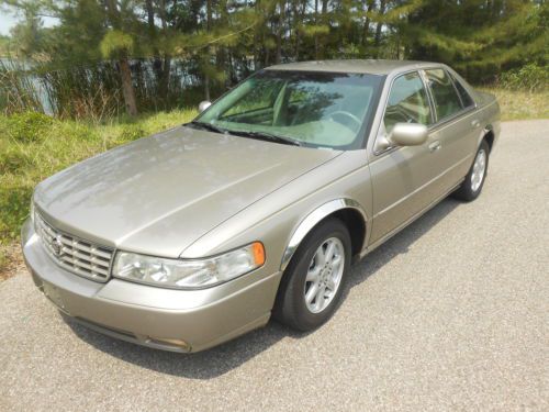 Cadillac seville sts  heated seats  low miles  non smoker   runs great    sharp