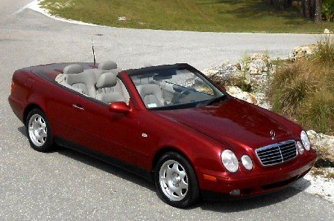 Magma red convertible~canvas power top~heated seats~leather~michelins~ 00 01 02
