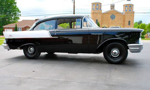 1957 chevrolet 150 2 door sedan. black/white 4speed 2x4 hotrod