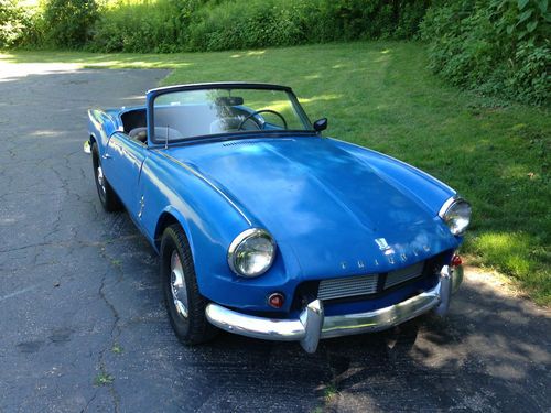 1965 triumph spitfire 4,  runs/drives.  very early car for restoration