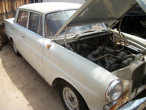 1964 mercedes 190 4 dr sedan,  4 cyl., ac.