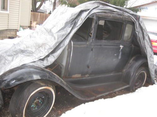 1930-31 ford coupe needs restored togeather car. original car.