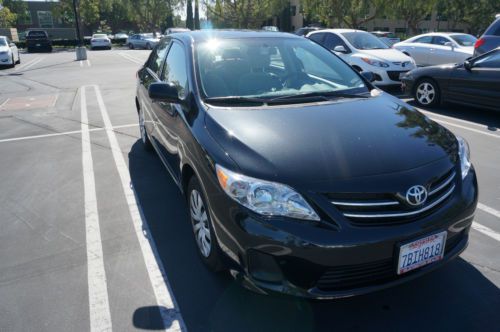 2013 black toyota corolla le with 7,200 miles