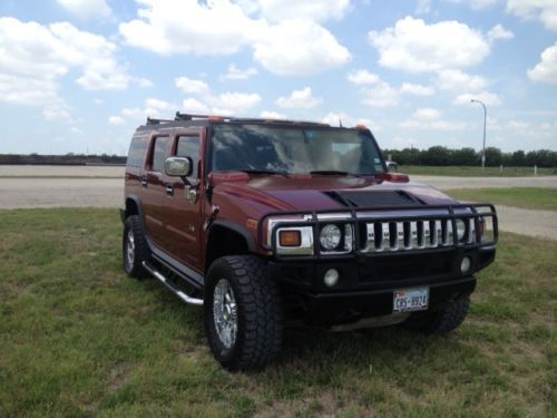 Burgundy 2004 h2, excellent running condition, 3rd row seat, awd