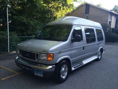 2004 ford e-150 conversion van. excellent condition. flat screen tv/dvd, ps3.