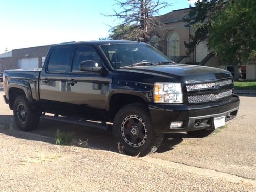 Black, great shape, small lift, 20&#034; wheels, brand new tires, 97,000 miles