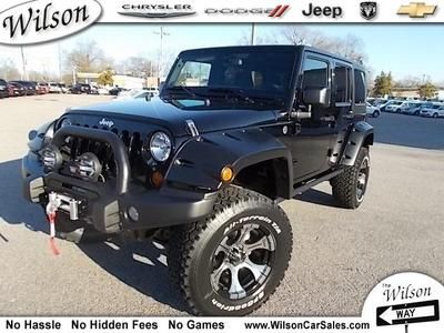 Jeep wrangler 4x4 off road hard top lift tires warn winch fender flares bumpers