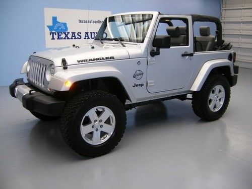 We finance!!!  2010 jeep wrangler sport 4x4 auto soft top cd 18 rims 1 owner!!