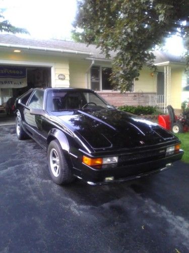 1985 supra in oringial condition. black with leather interior.