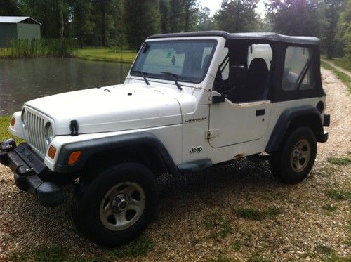 1998 jeep wrangler se sport utility 4x4 4 cyl 5 spd 167k nice top nice project!