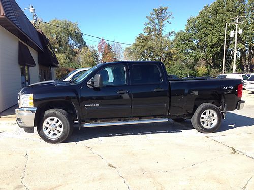 Black beauty low miles excellent condition. 4x4 duramax crew cab