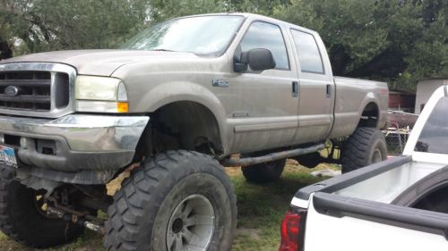 2002 f250 7.3 diesel 20" lift 49" tires jvc dvd in dash