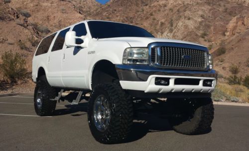 2002 ford excursion stuck in 4x4 low range