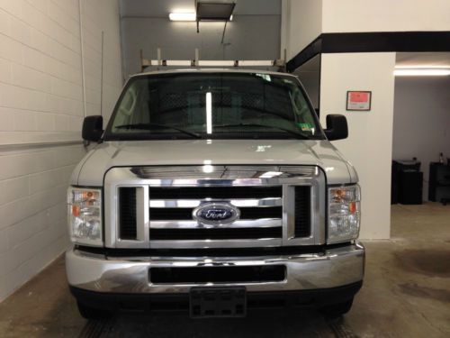 2008 ford e-150 base standard cargo van 3-door 5.4l. !!!divider, rack, shelves!!