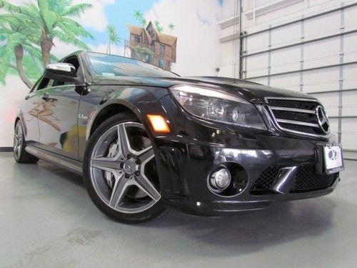 2009 mercedes benz c-63 amg,38k only,navigation,heated,factory warranty !!