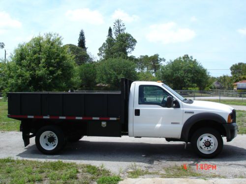2005 ford f450 4x4 diesel flat bed w/removeable cargo sides dually super clean