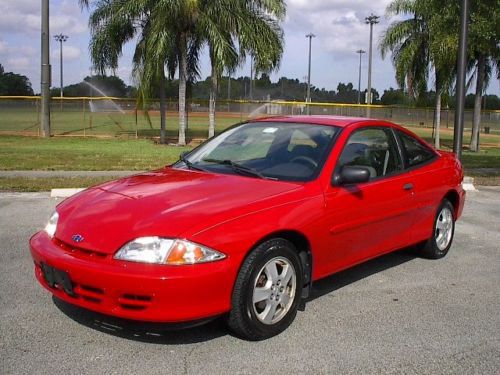 Cavalier coupe low mileage only 96k fuel miser new tires torch red no reserve