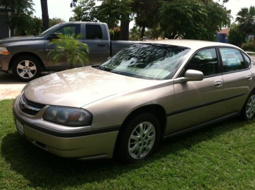 2002 chevy impala used tan 4 door v6 sedan 56670 original miles, runs great!