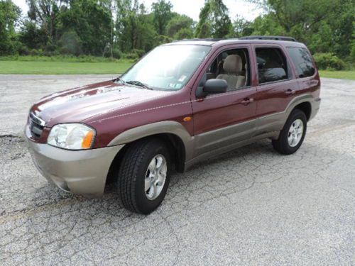 2003 mazda tribute, no reserve,no accidents, looks and runs gtreat, awd.