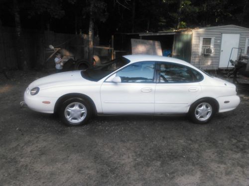 Clean taurus ford. low miles.... steal of a deal