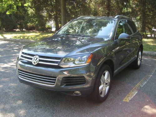 Tdi, diesel, 5300 miles, navigation, start button, will export, cost $57k new