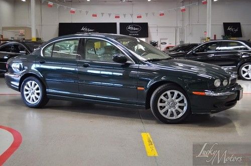 2003 jaguar x-type 2.5l awd,  heated leather, sunroof, fog lights, cd, wood