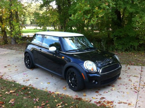 2009 mini cooper, black and white, low miles!!!!excellent condition!!!!