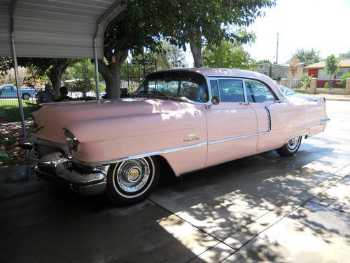 Beautiful vegas style cadi, pink with black interior.