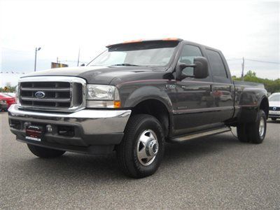 We finance! lariat le 4x4 supercrew dually only 81k 7.3l powerstroke 1owner!