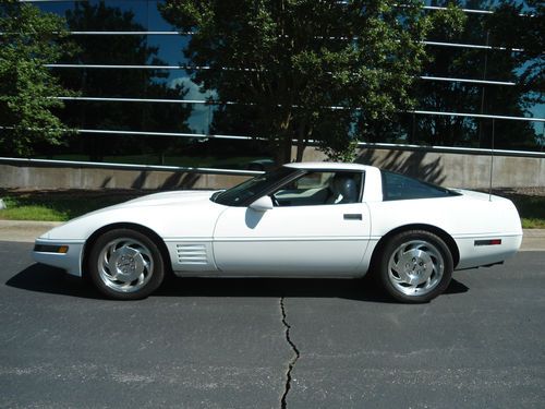White coupe, new tires, 1993 corvette in showroom condition low mileage.