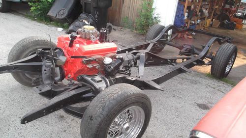 1957 chevy belair convertible frame with 283 power pack motor all restored,