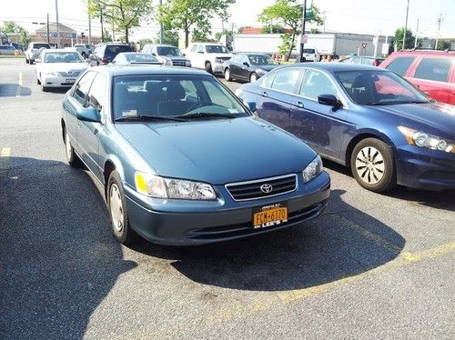 Toyota camry 2000, 4 door sedan, air conditioning, radio, power steering, stereo