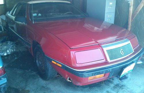 Red 1988 chrysler lebaron convertible in fair condition