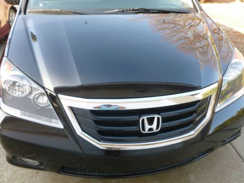 2009 honda odyssey touring v6 fully loaded with gps. dvd. moon roon, 4wheel abs