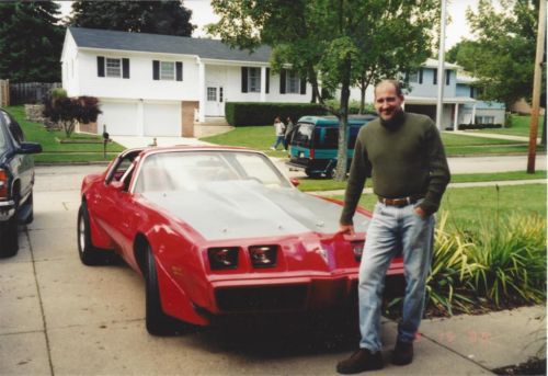 Red pro-street trans-am with tilt/lift-off fiberglass front end