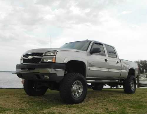 2005 silverado 2500..crew cab..diesel..lifted..4x4..leather..dvd..37" tires