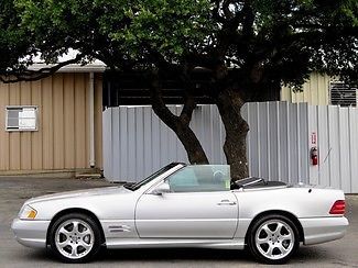 Low mileage convertible power with hardtop power seats leather heated clean