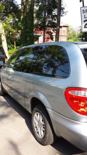 2002 dodge grand caravan sport;  very good condition and new radiator and tires